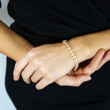 Load image into Gallery viewer, Victoria Regal Cubic Zirconia Tennis Bracelet Gold Plated